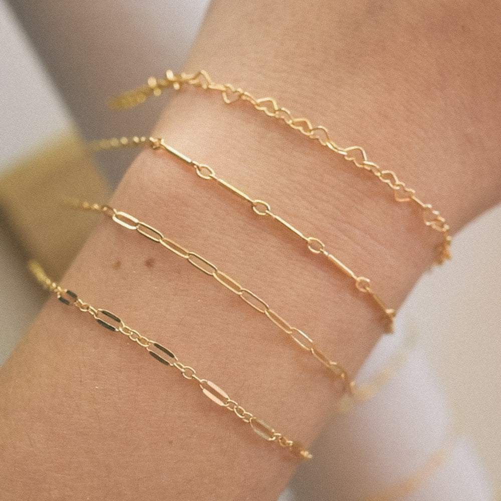 permanent jewelry, forever bracelets on wrist in gold fill 
