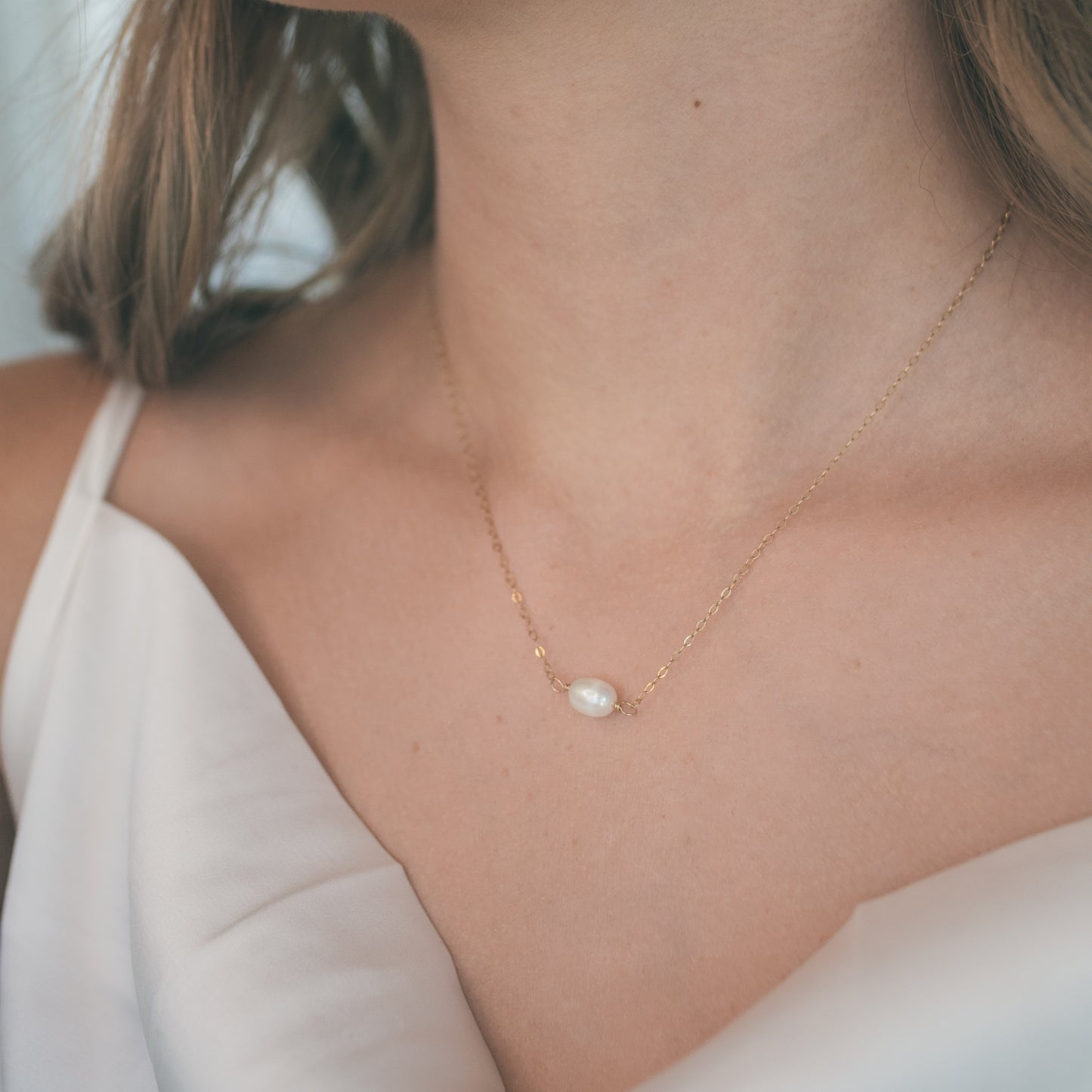 
                  
                    Oval Pearl Necklace
                  
                