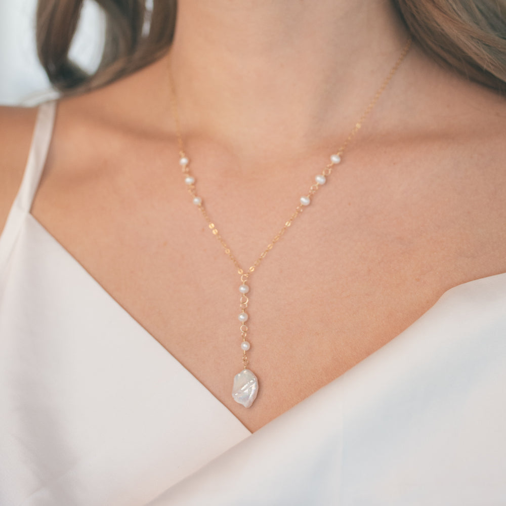 
                  
                    Poppy Lariat Necklace
                  
                