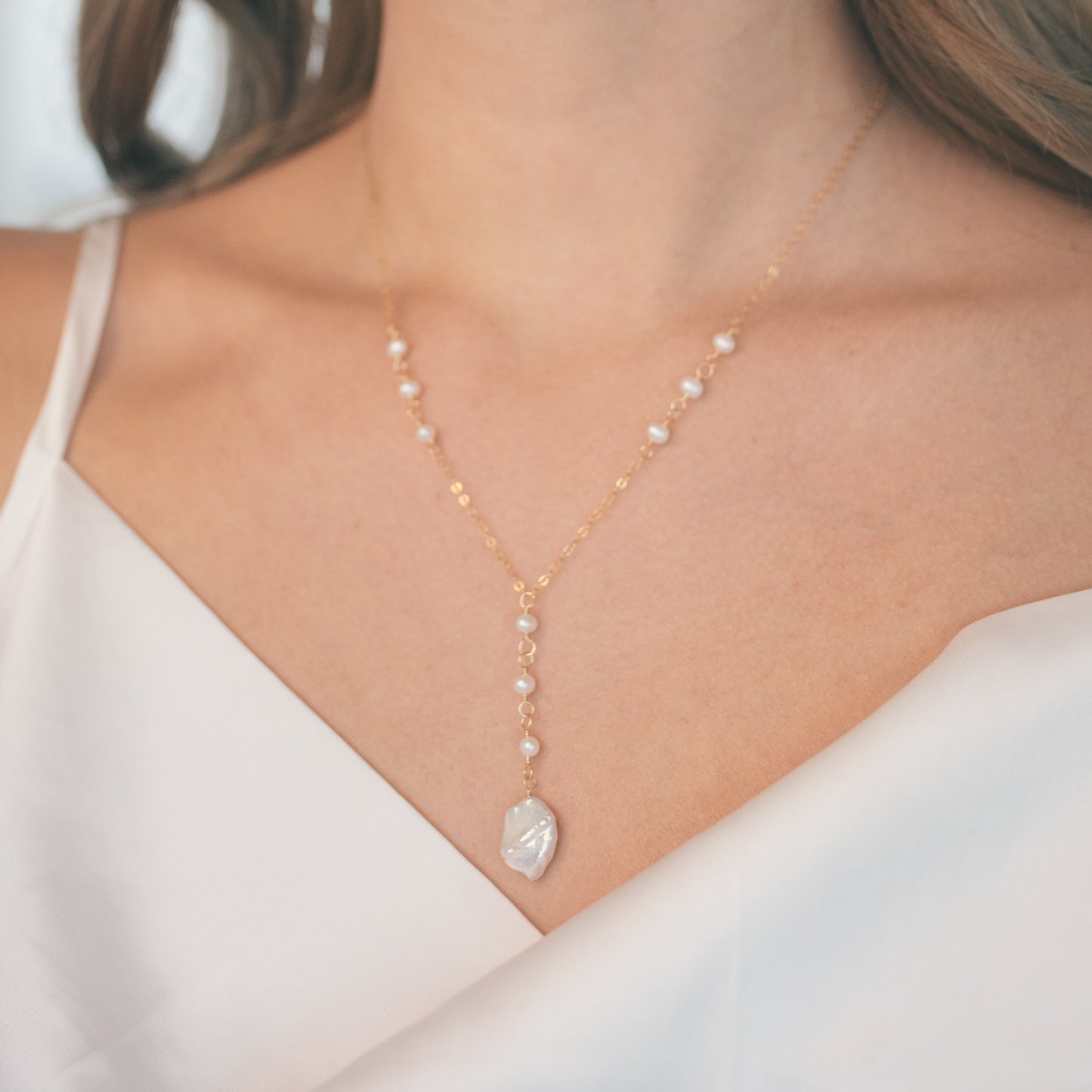 
                  
                    Poppy Lariat Necklace
                  
                
