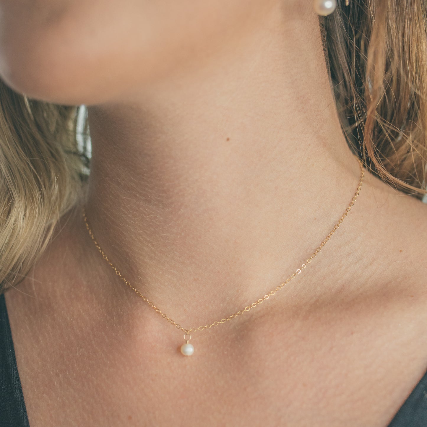 
                  
                    Petite Pearl Back Necklace
                  
                