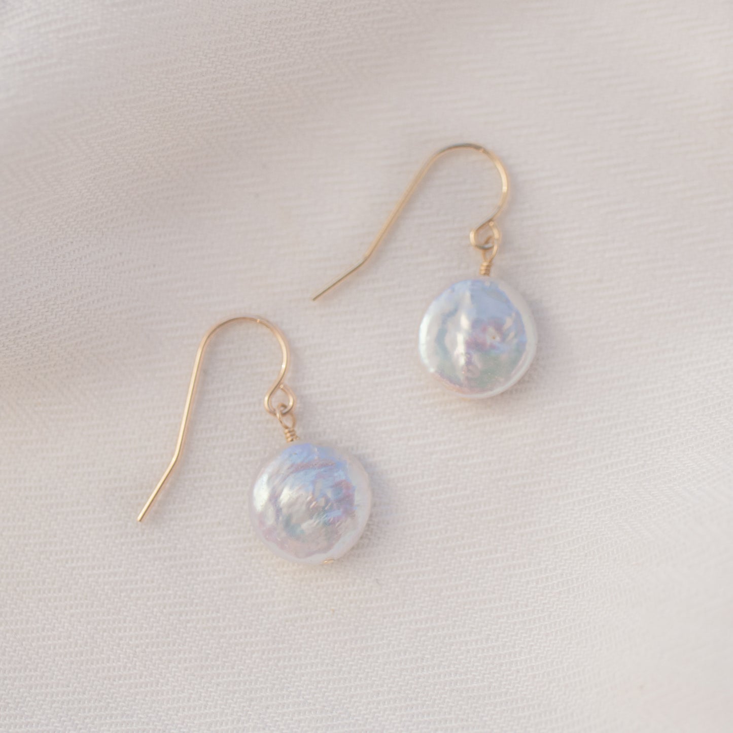 
                  
                    Coin Pearl Earrings
                  
                