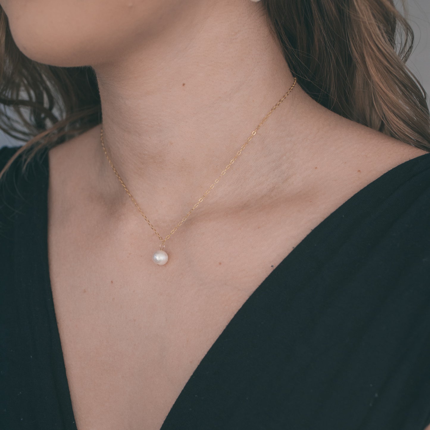 
                  
                    Pearl Trio Back Necklace
                  
                