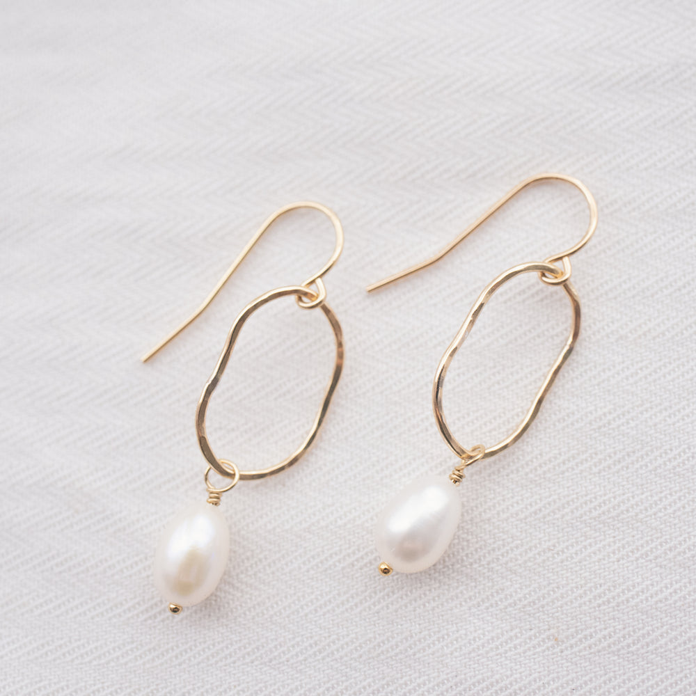 
                  
                    Organic Pearl Earrings
                  
                