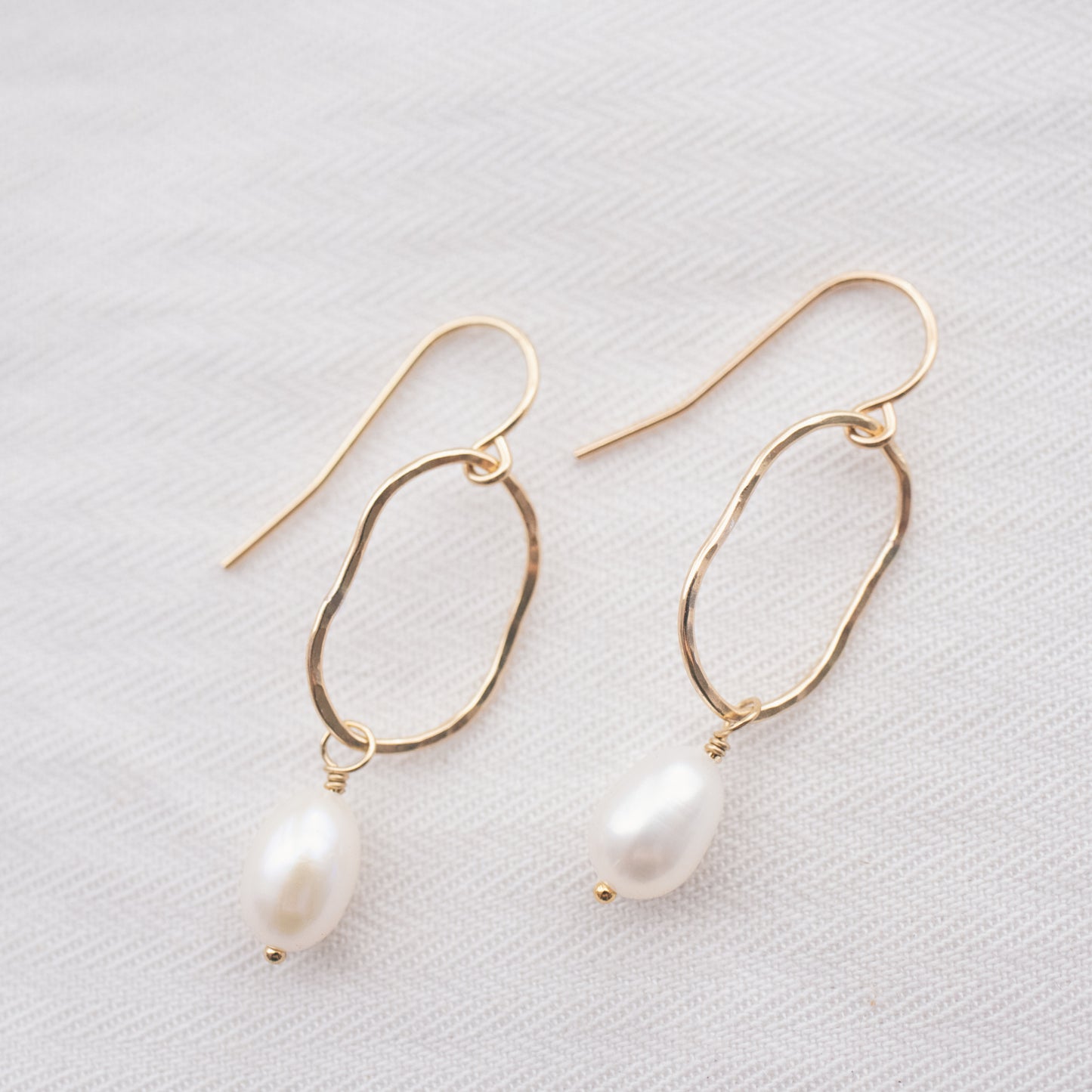 
                  
                    Organic Pearl Earrings
                  
                