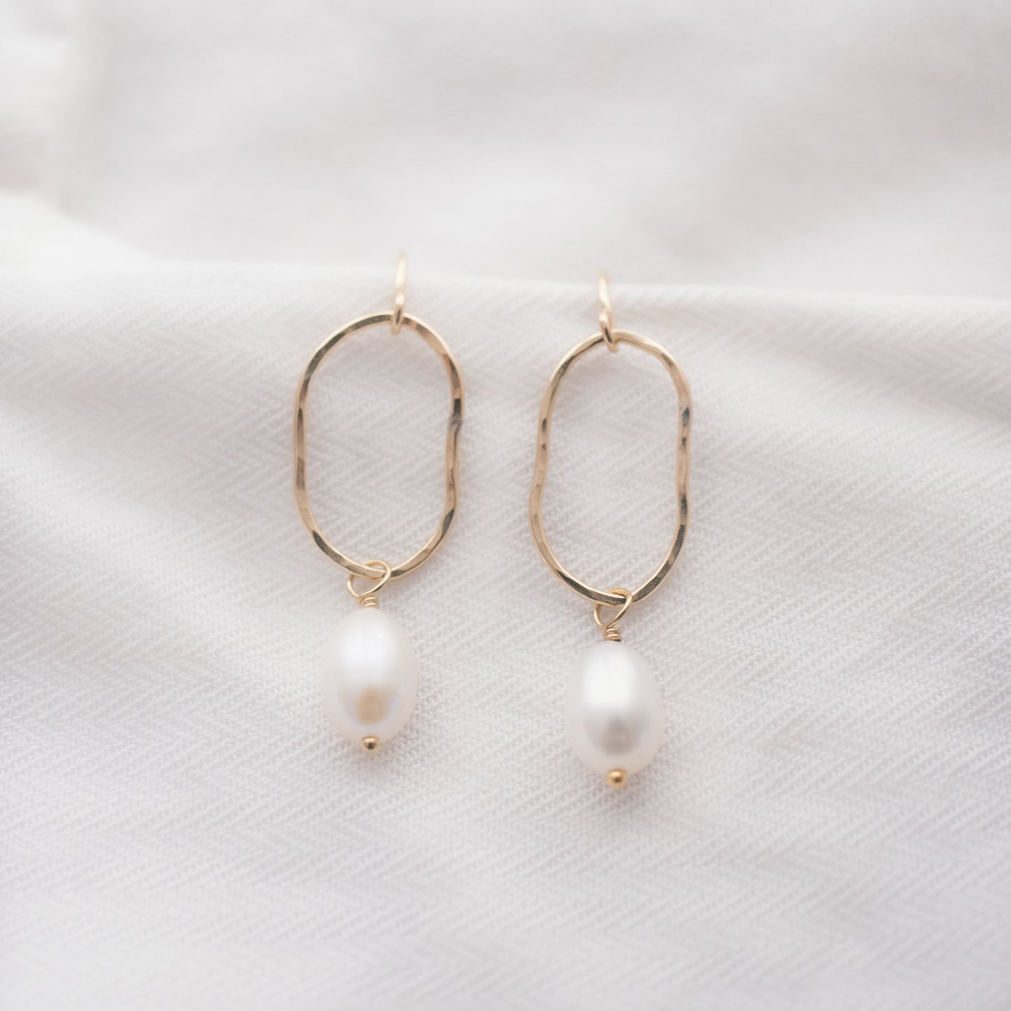 
                  
                    Organic Pearl Earrings
                  
                