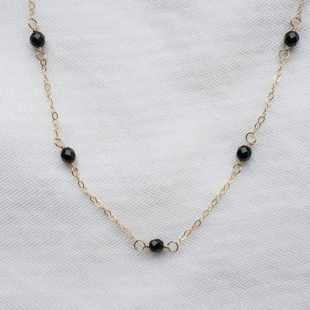 
                  
                    Onyx Satellite Necklace
                  
                