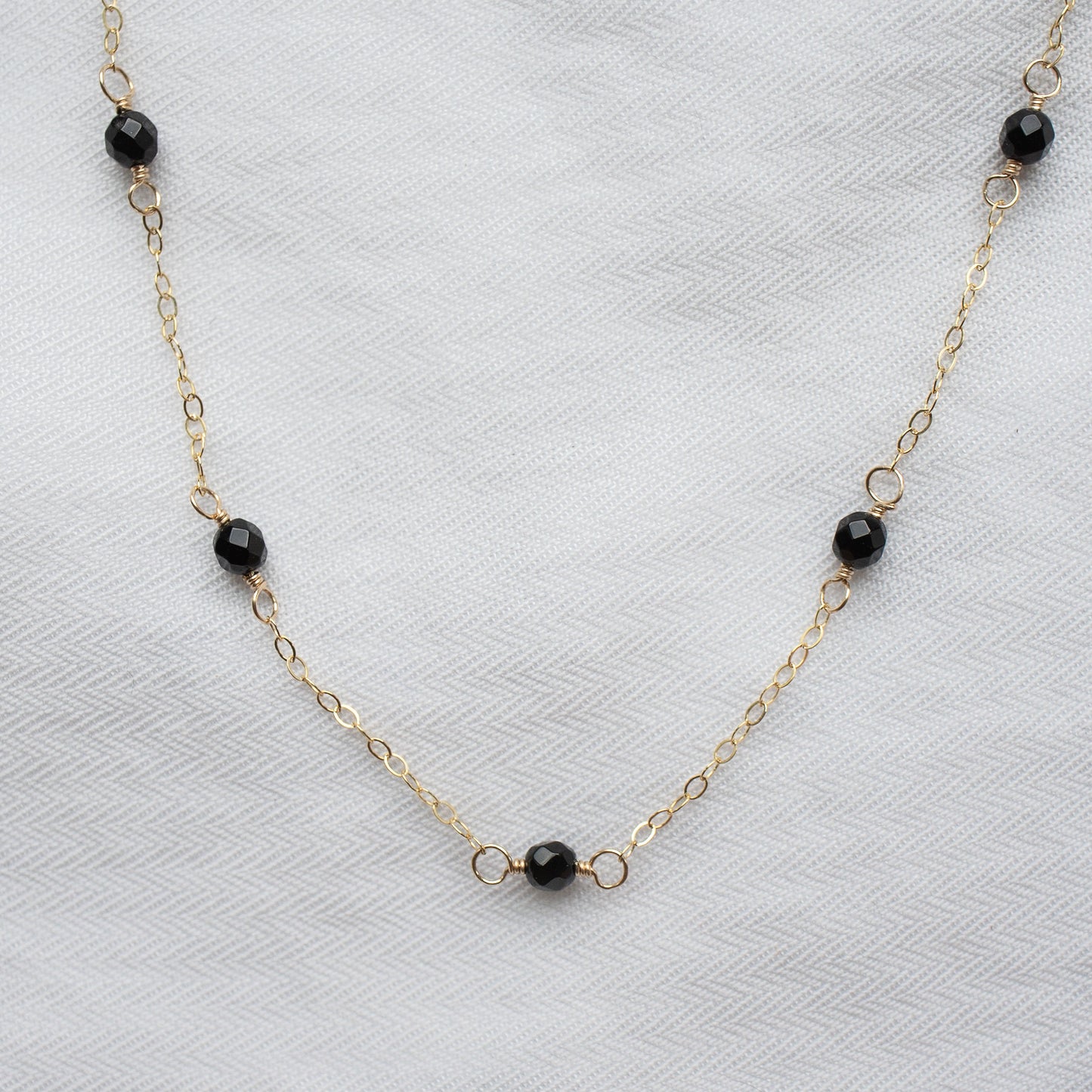 
                  
                    Onyx Satellite Necklace
                  
                