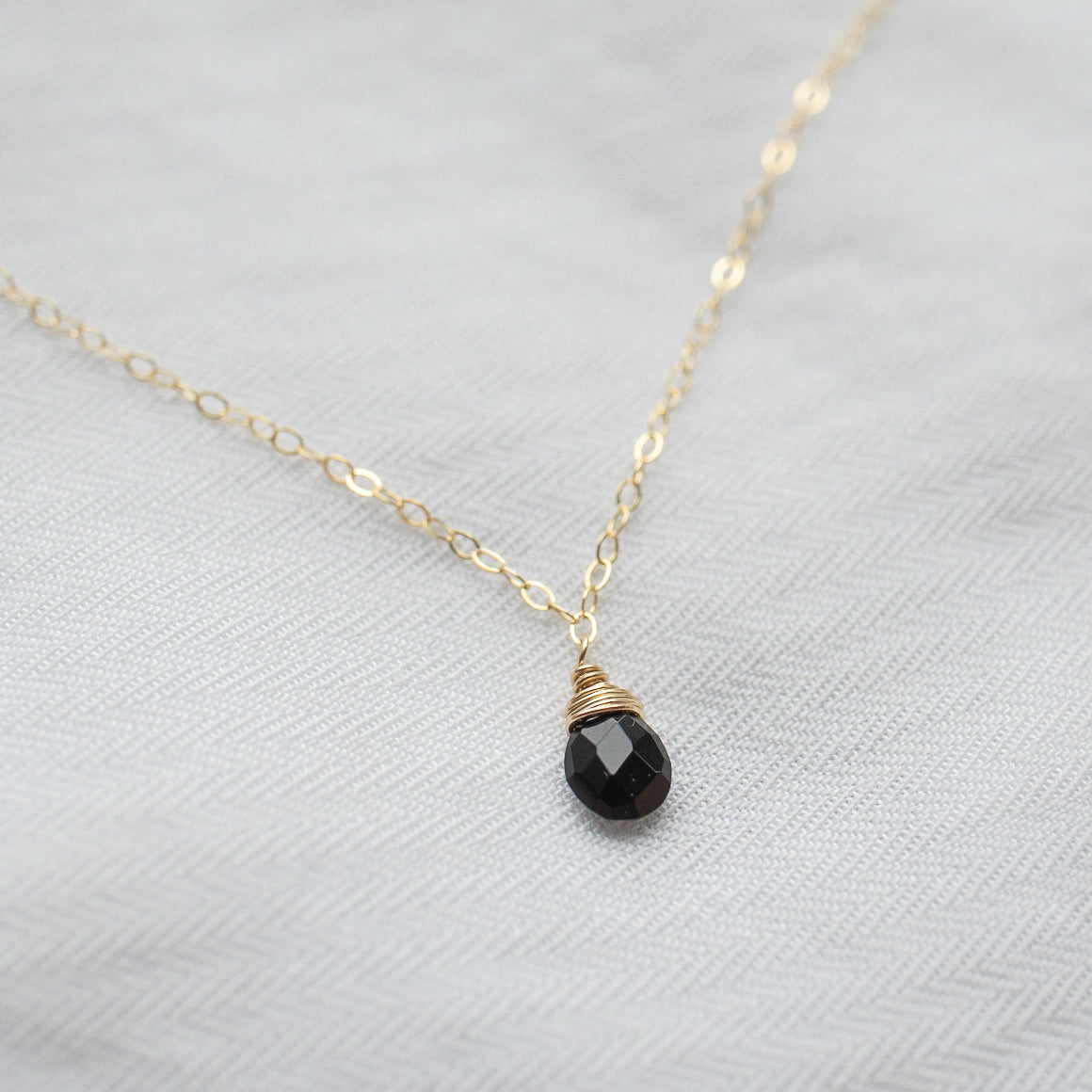 
                  
                    Onyx Back Necklace
                  
                