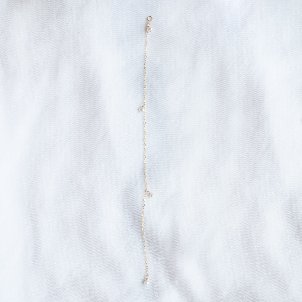
                  
                    Pearl Droplet Back Necklace
                  
                