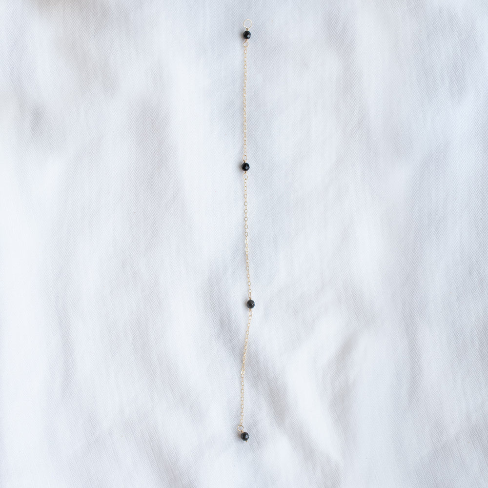 
                  
                    Onyx Back Necklace
                  
                
