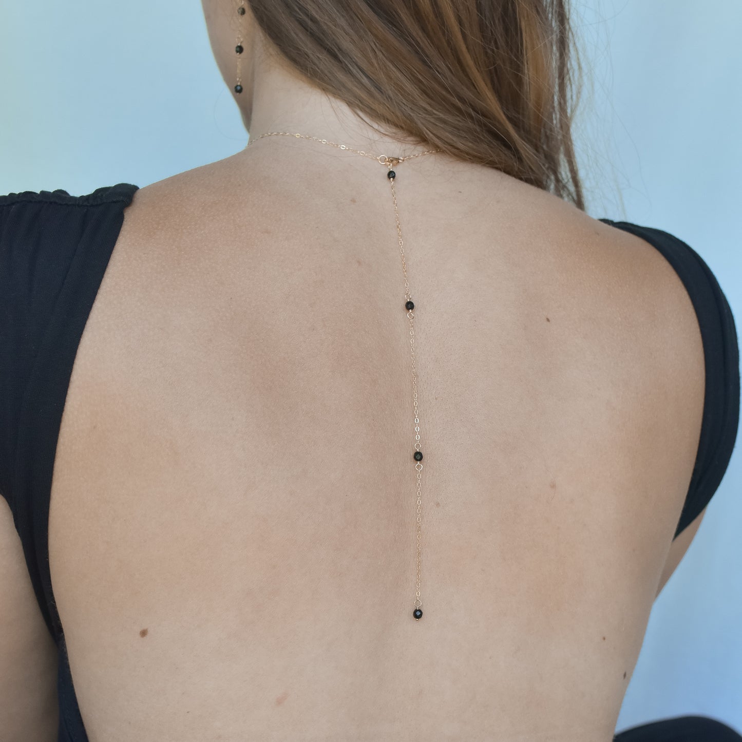 
                  
                    Onyx Back Necklace
                  
                