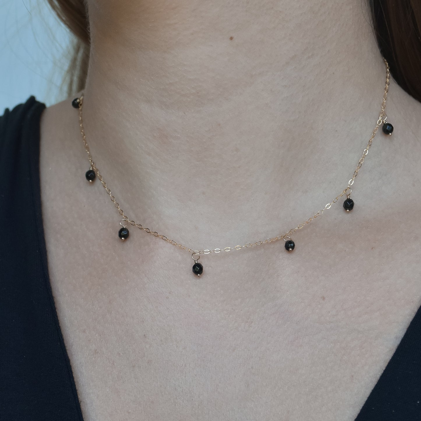 
                  
                    Onyx Droplet Back Necklace
                  
                