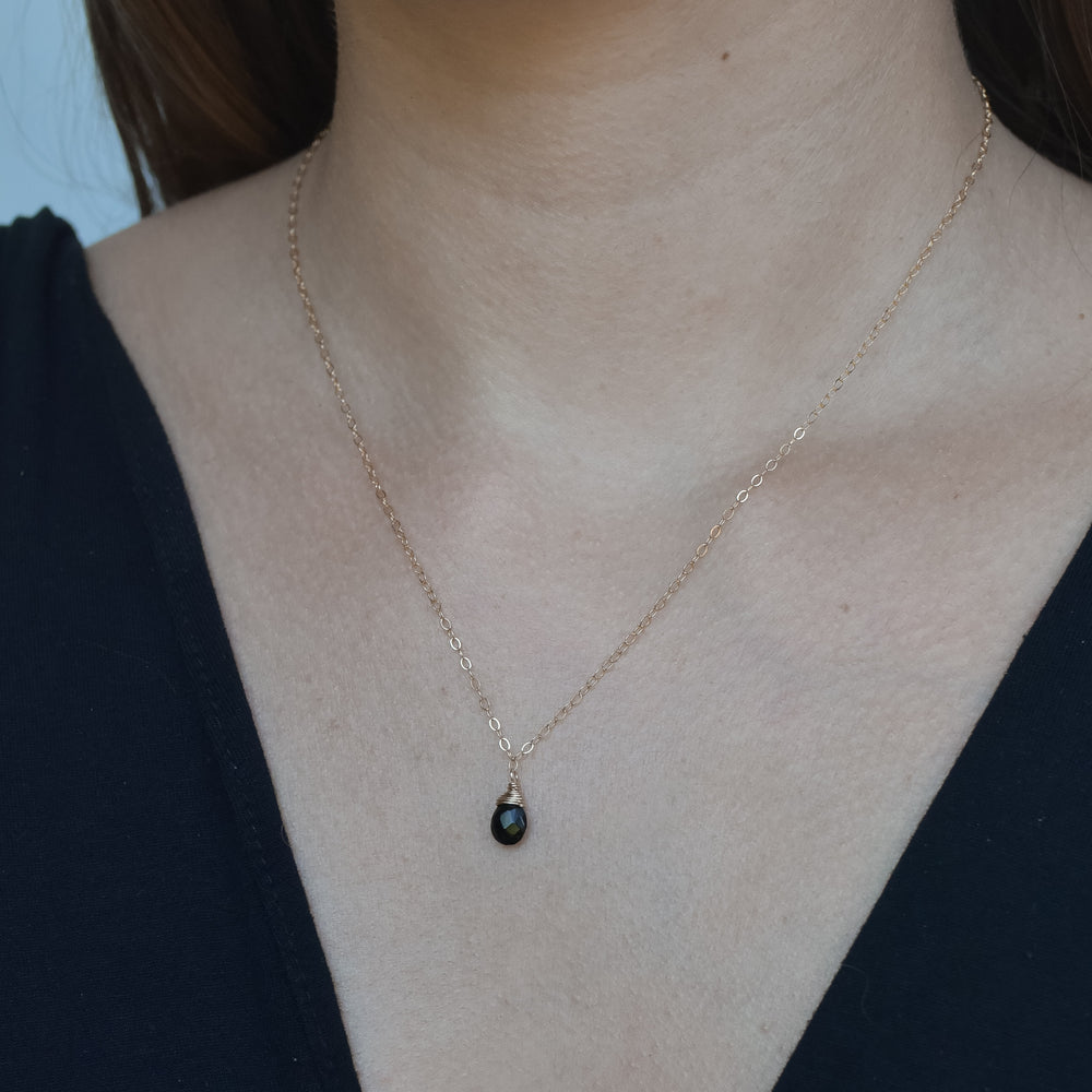 
                  
                    Onyx Back Necklace
                  
                