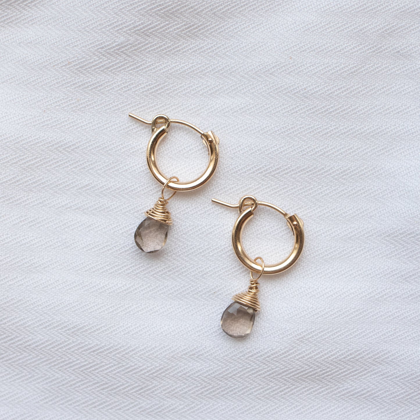 
                  
                    Smoky Quartz Huggie Hoops
                  
                