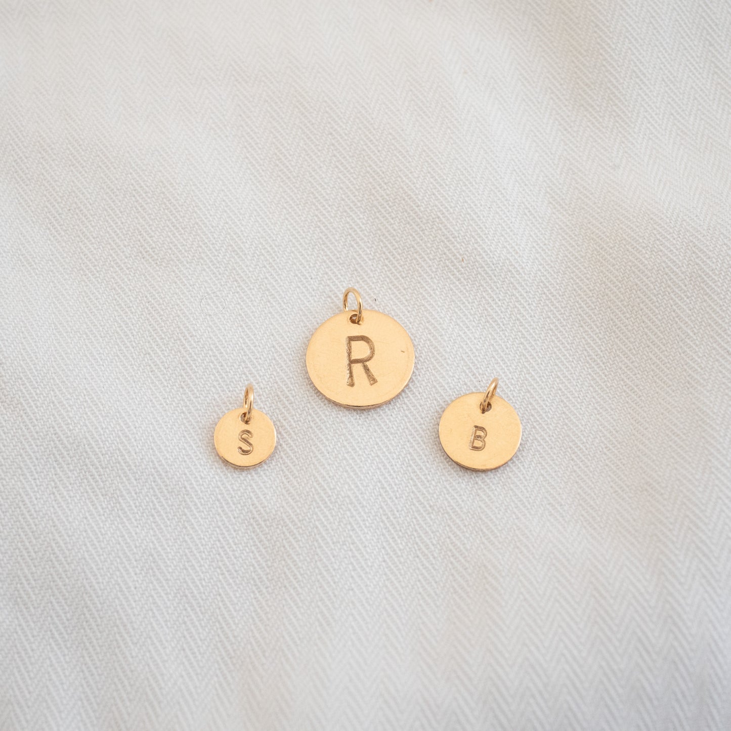 
                  
                    Initial Charms
                  
                