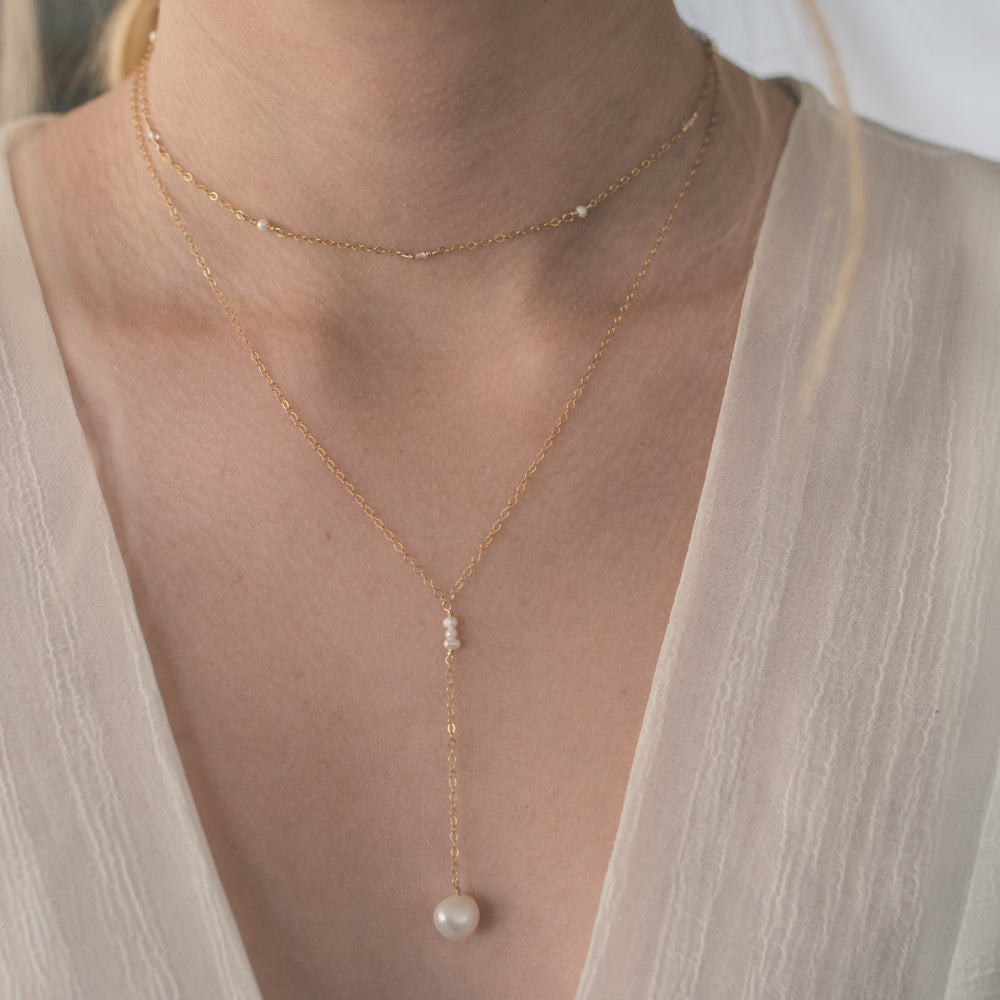 
                  
                    Classic Pearl Lariat Necklace
                  
                