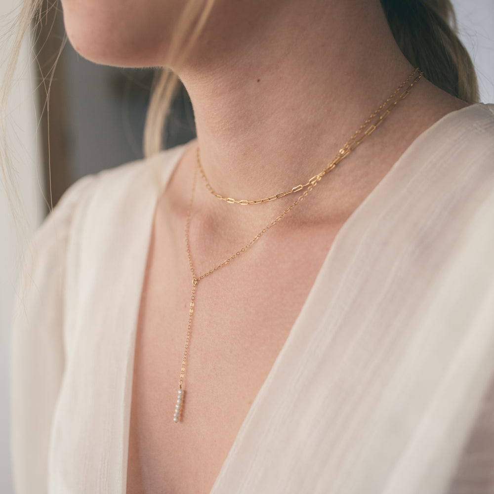 
                  
                    Mini Pearl Lariat Necklace
                  
                