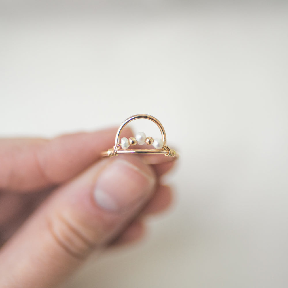 
                  
                    Pearl Arch Ring
                  
                