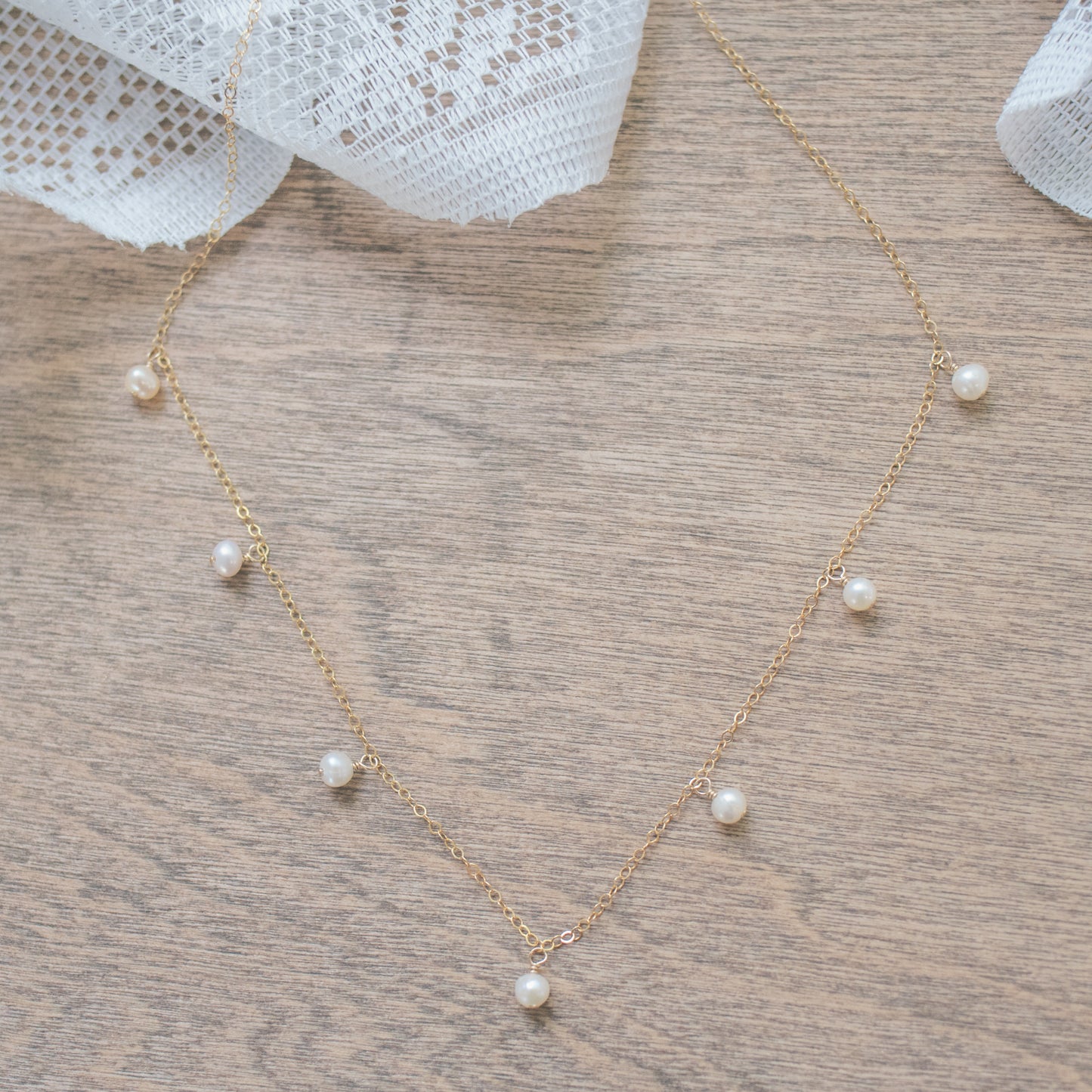 
                  
                    Pearl Droplet Necklace
                  
                