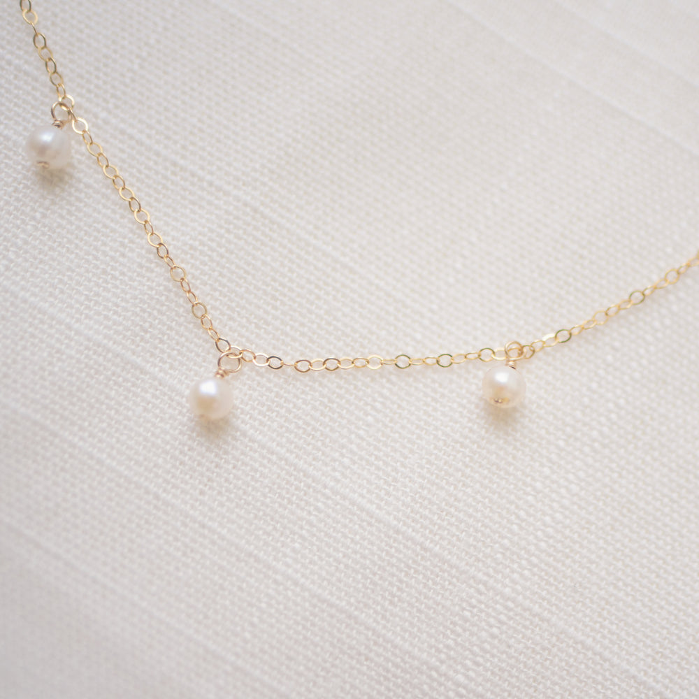 
                  
                    Pearl Droplet Necklace
                  
                