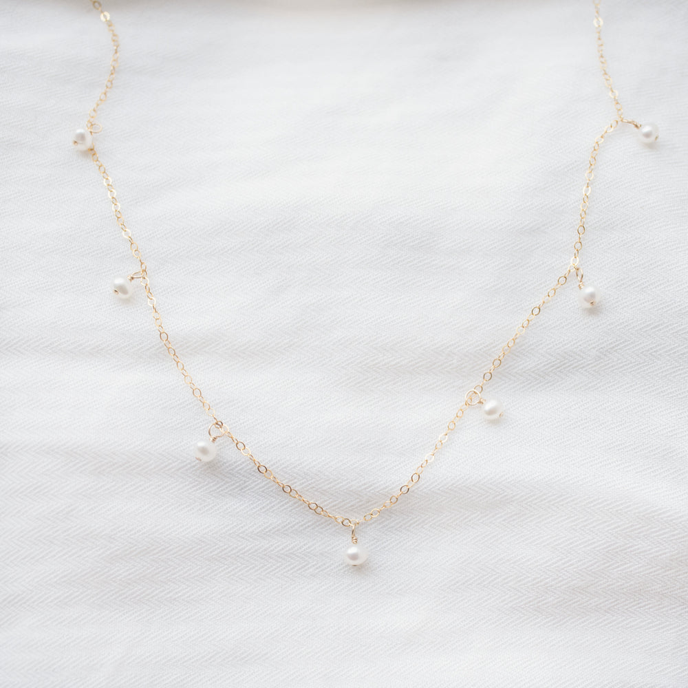 
                  
                    Pearl Droplet Necklace
                  
                