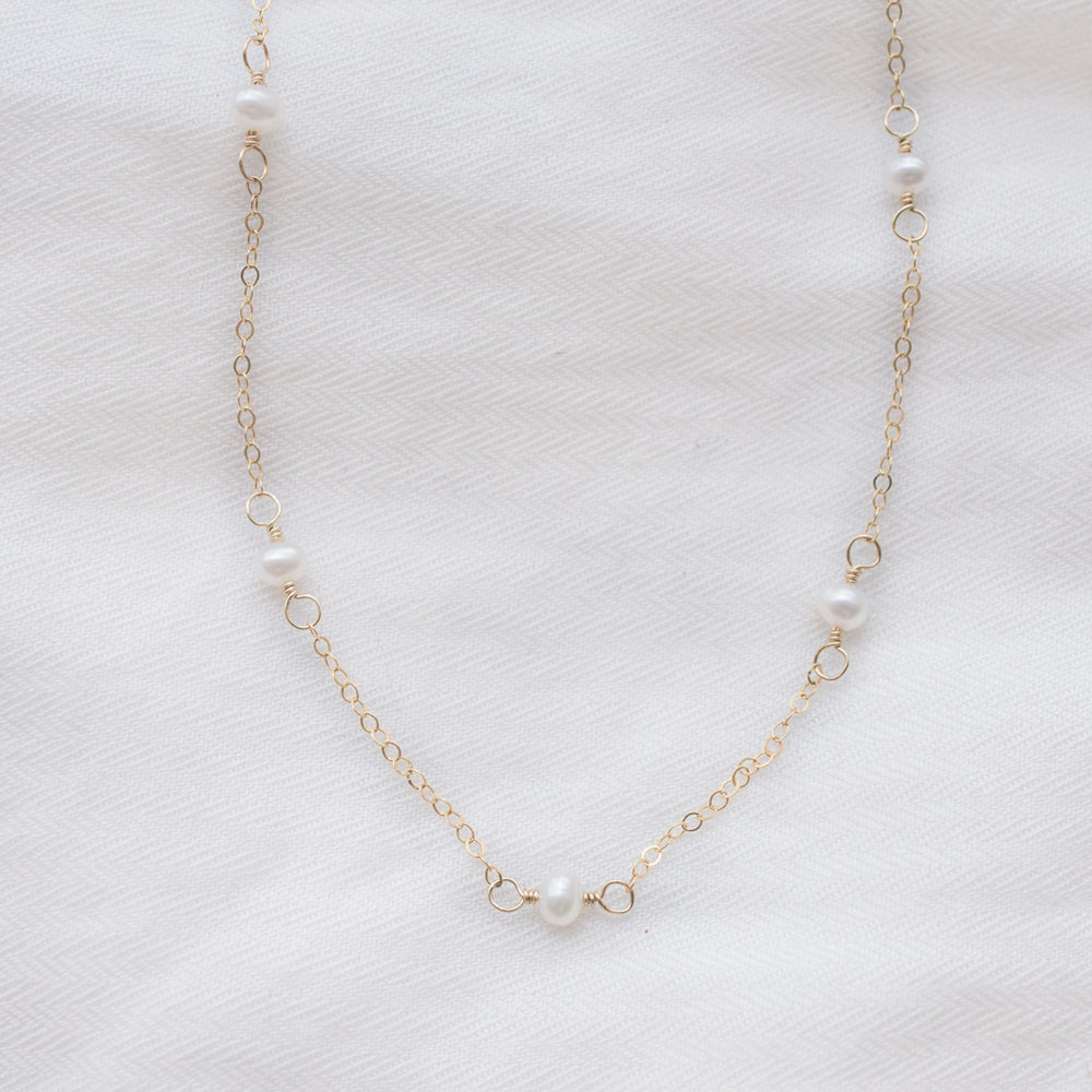 
                  
                    Pearl Satellite Necklace
                  
                