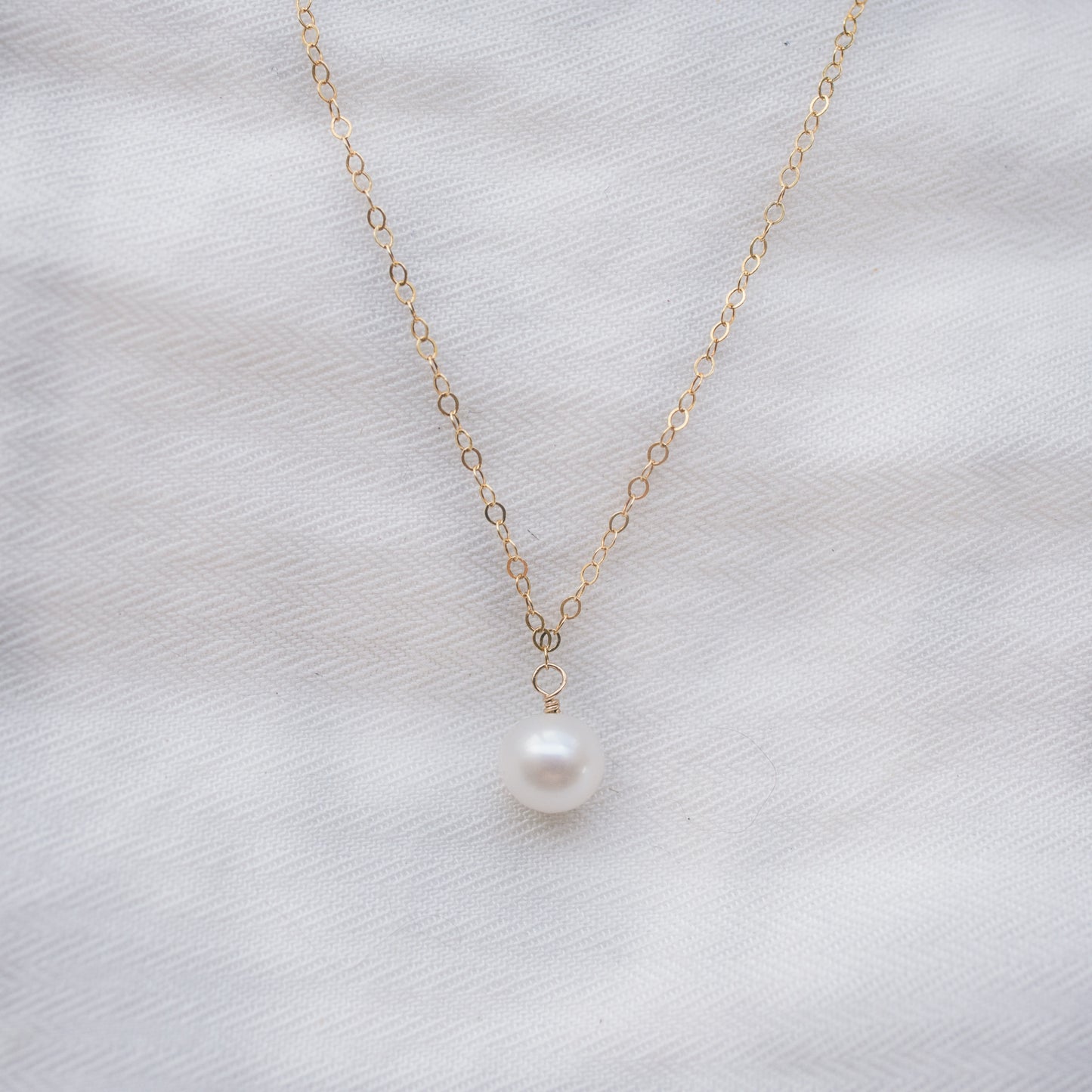 
                  
                    Classic Pearl Pendant Necklace
                  
                