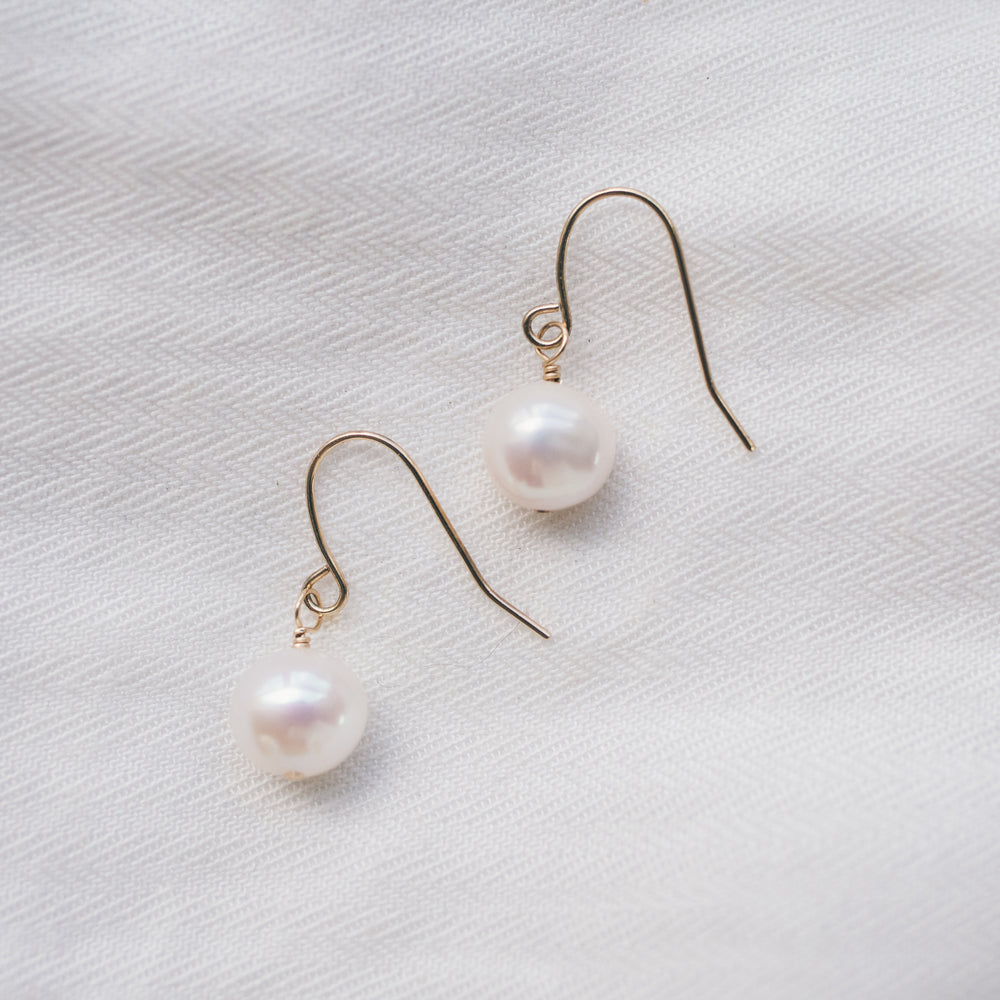 
                  
                    Classic Pearl Earrings
                  
                