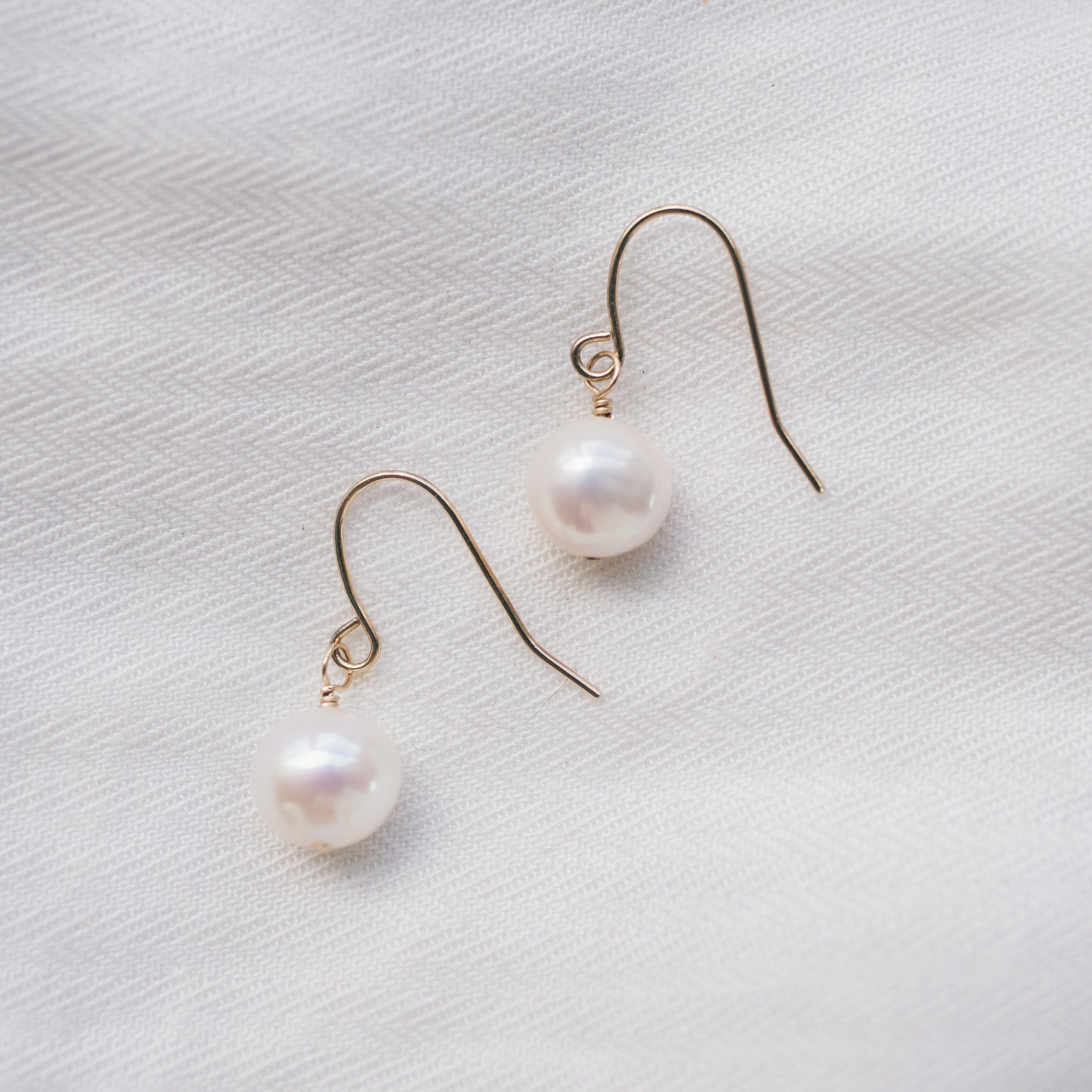 
                  
                    Classic Pearl Earrings
                  
                