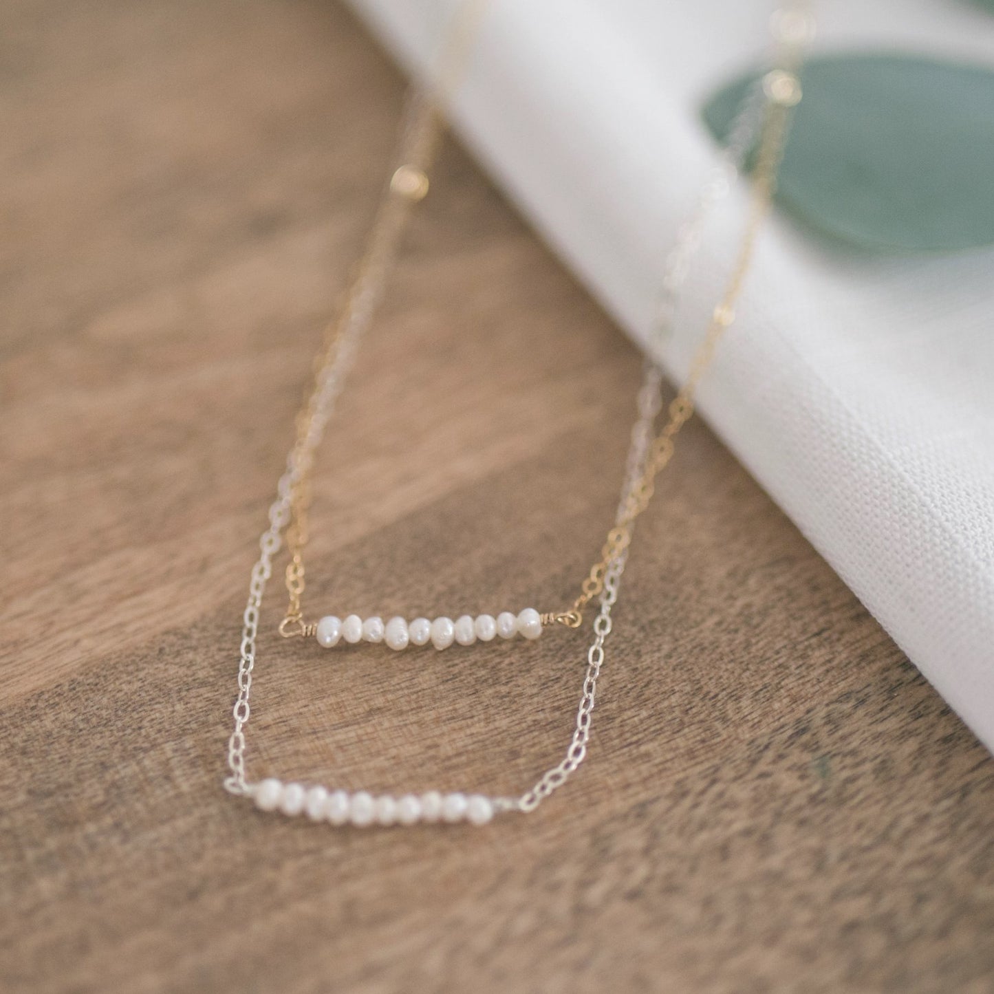 
                  
                    Pearl Bar Necklace
                  
                