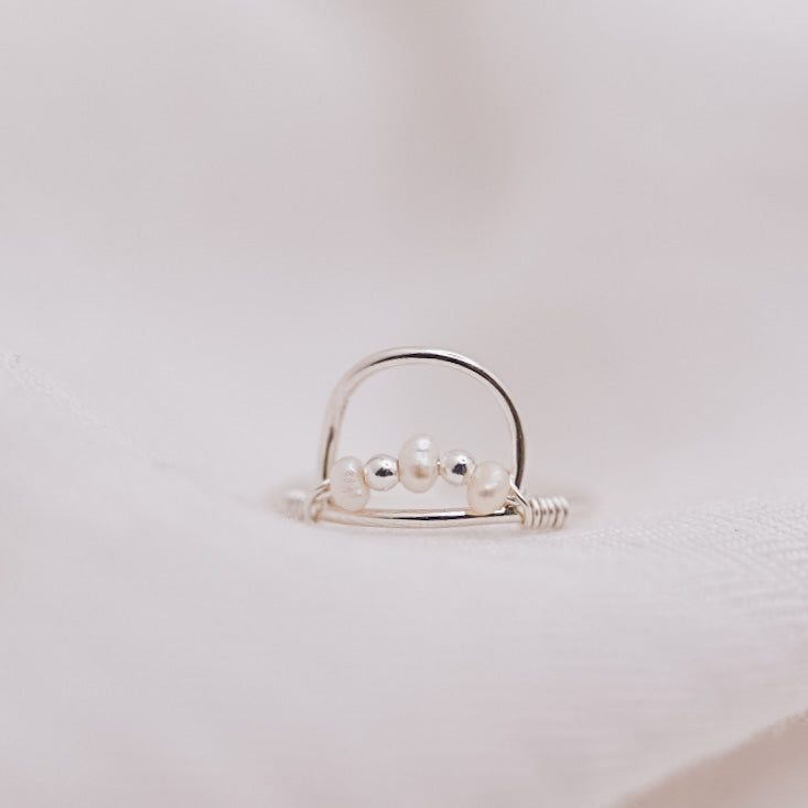 
                  
                    Pearl Arch Ring
                  
                