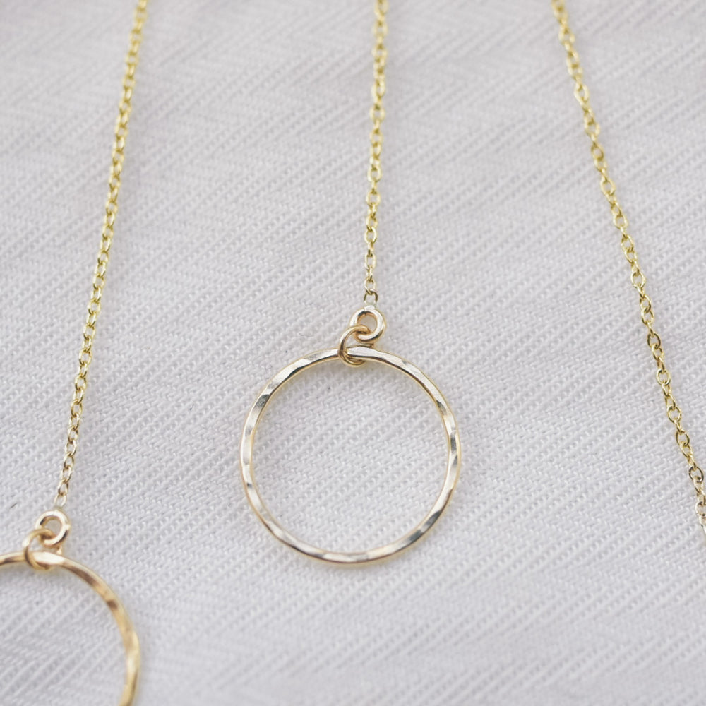 
                  
                    Open Circle Threader Earrings
                  
                