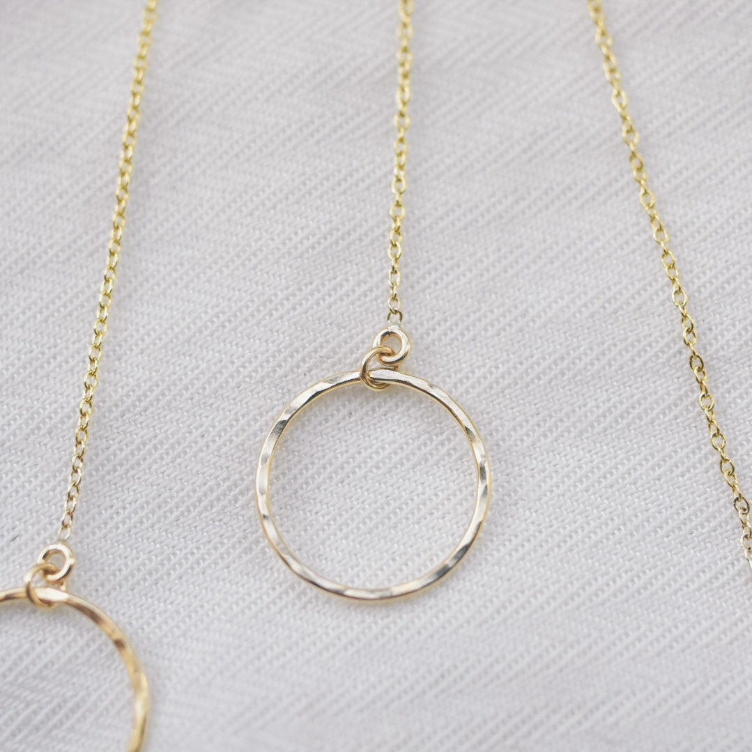 
                  
                    Open Circle Threader Earrings
                  
                