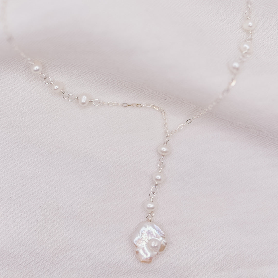 
                  
                    Poppy Lariat Necklace
                  
                