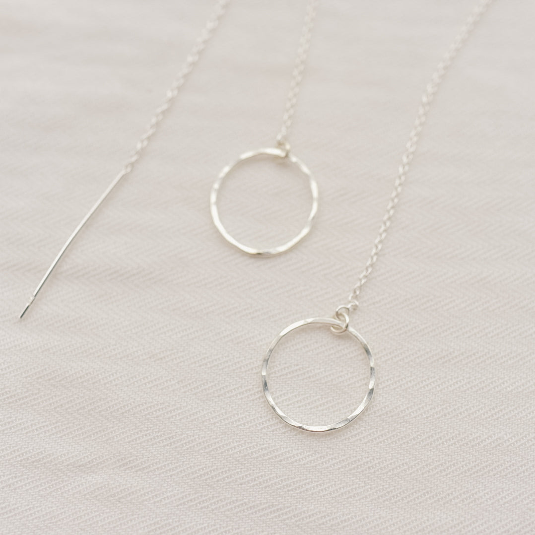
                  
                    Open Circle Threader Earrings
                  
                